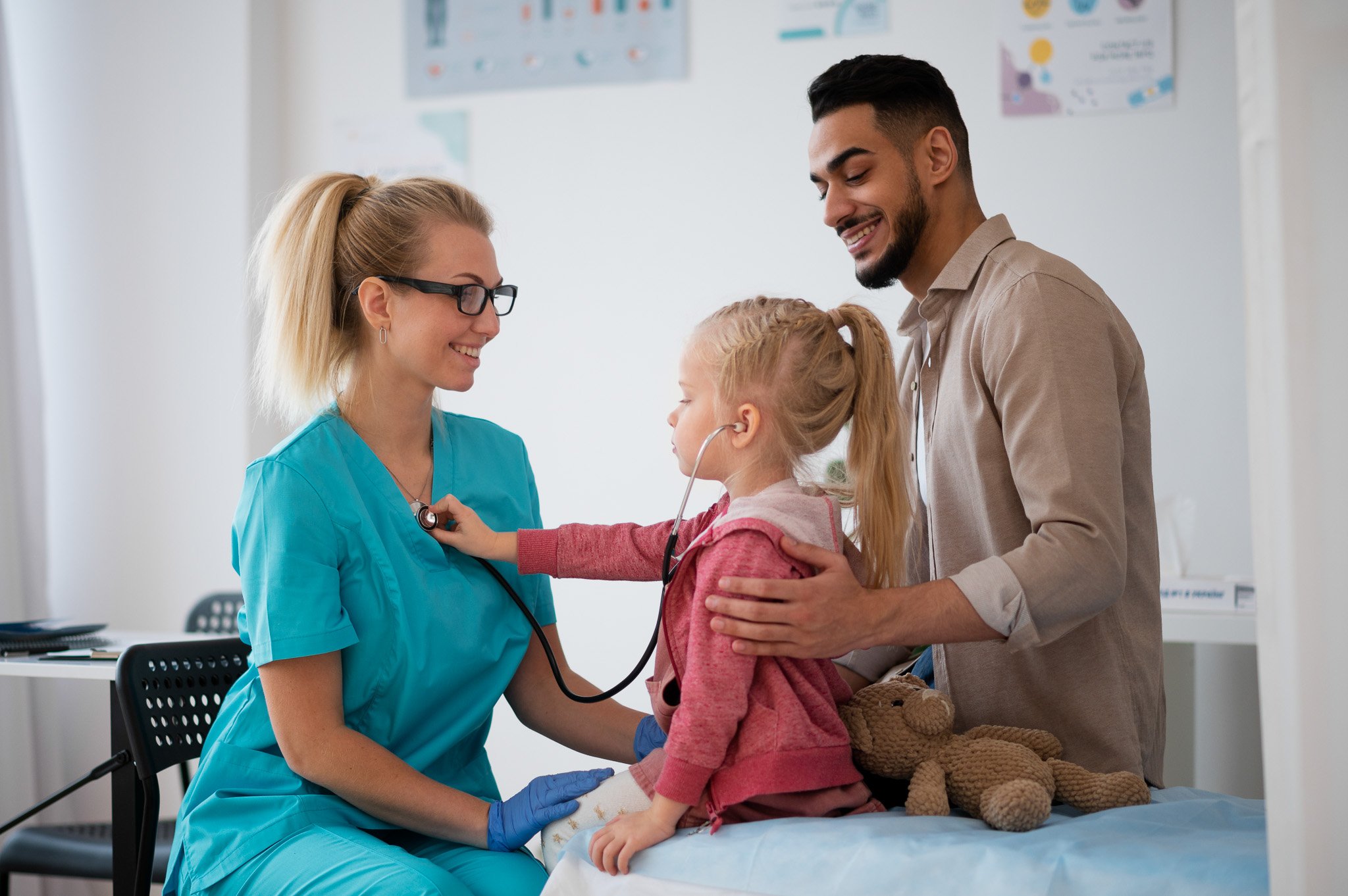 medical student assisting person