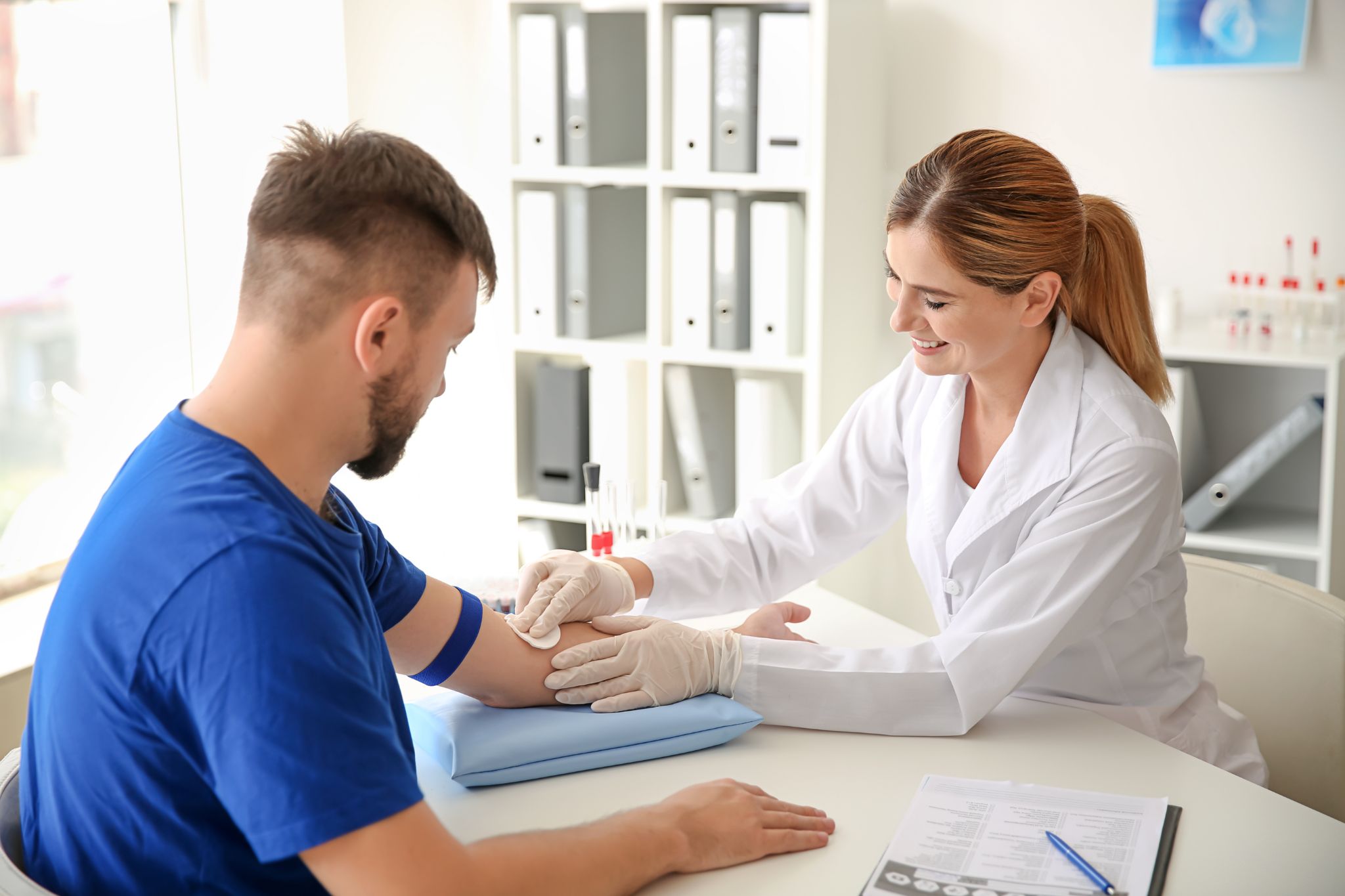 medical aide assisting patient.